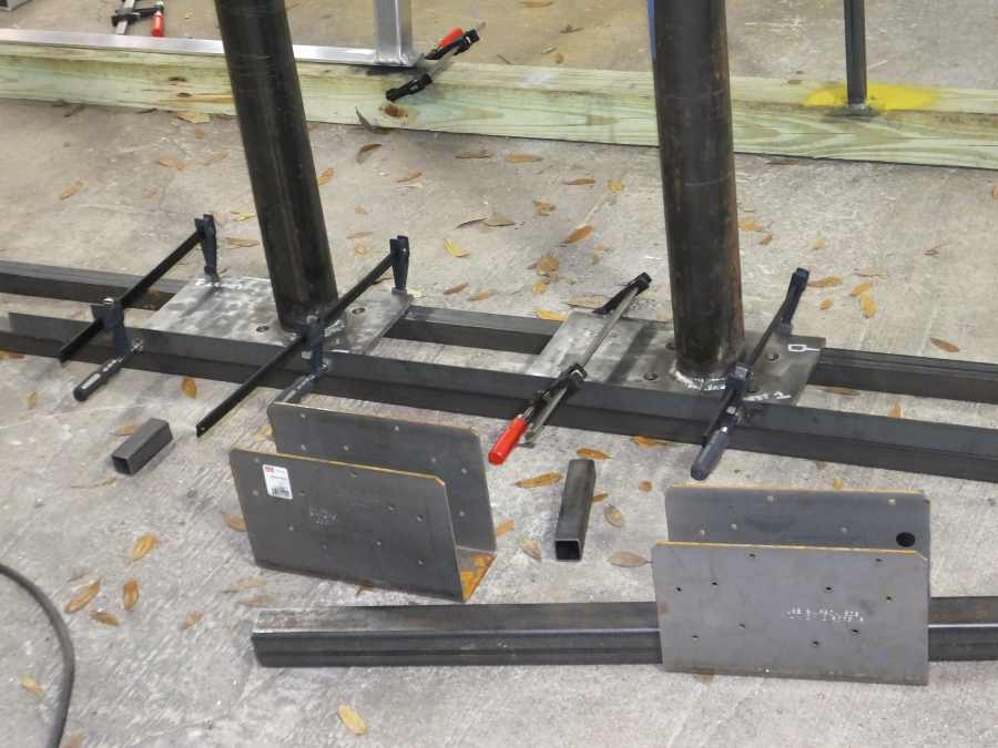 Fabricating steel suport columns. 