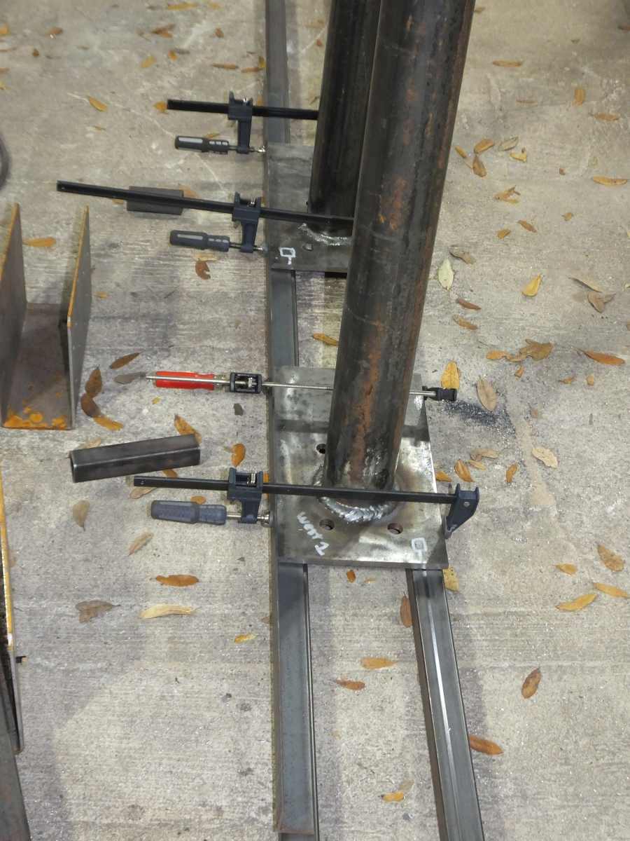 Fabricating steel suport columns. 