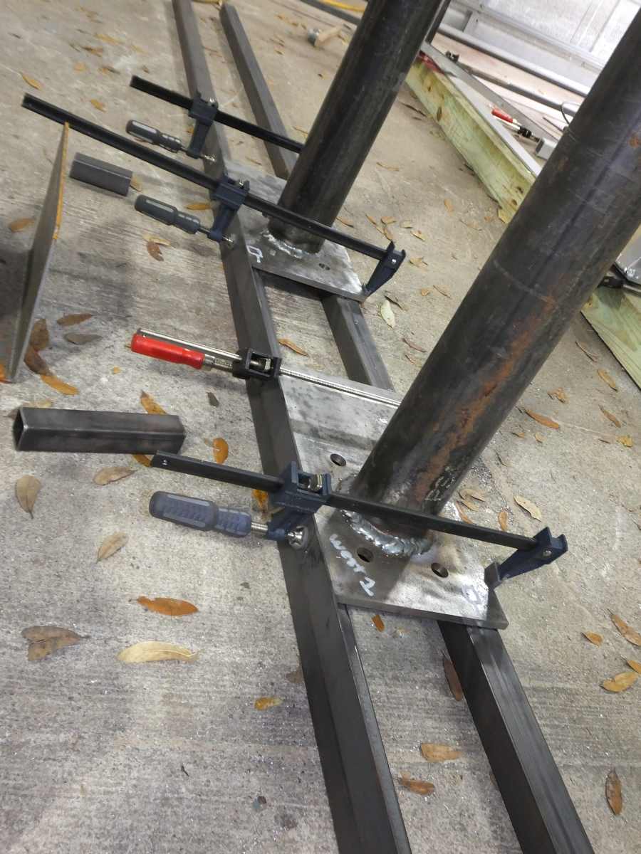 Fabricating steel suport columns. 